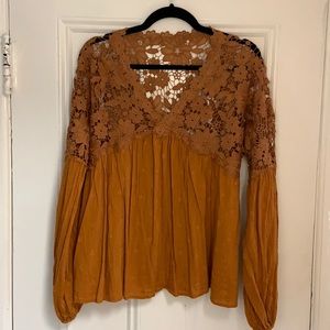 Barely worn flowy burnt orange Free People top.